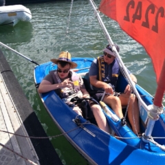 Mitchell in a dinghy