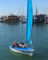 Mitchell in a dinghy