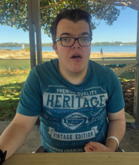 Mitchell sitting at a bench