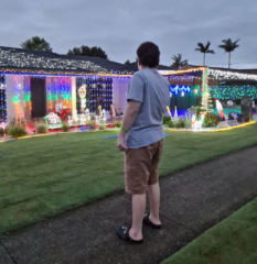 Mitchell looking at Christmas lights