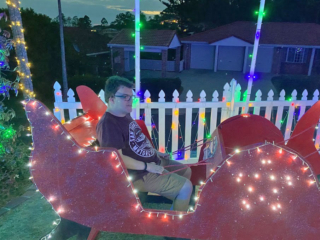 Mitchell looking at Christmas lights