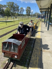 Mitchell sitting on the miniature train